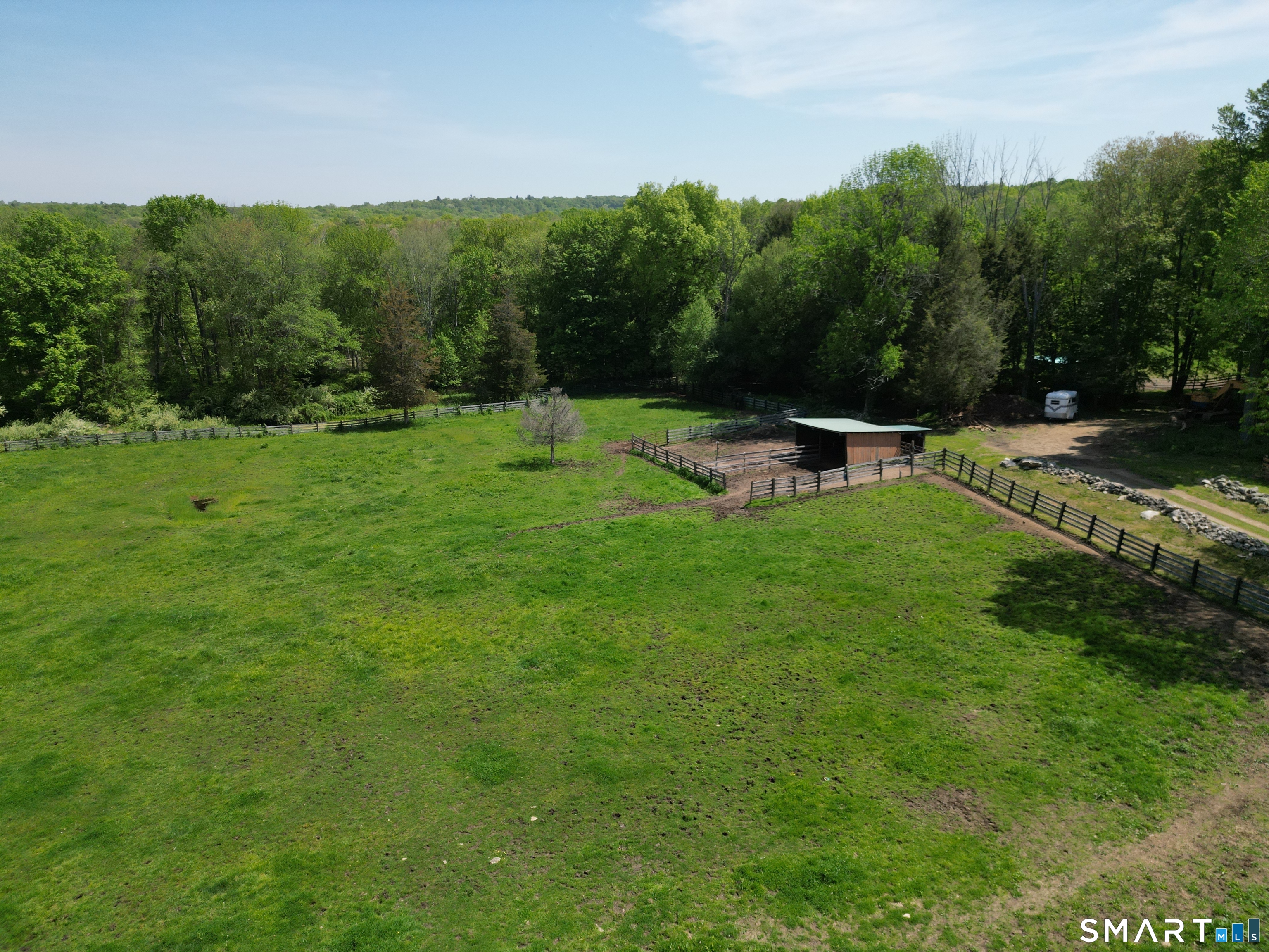 2880 Main Street Coventry, CT 06238 - Photo 35 of 40 Spacious 3-sided run-in barn equipped with electricity, water, and 2 gated paddock areas.