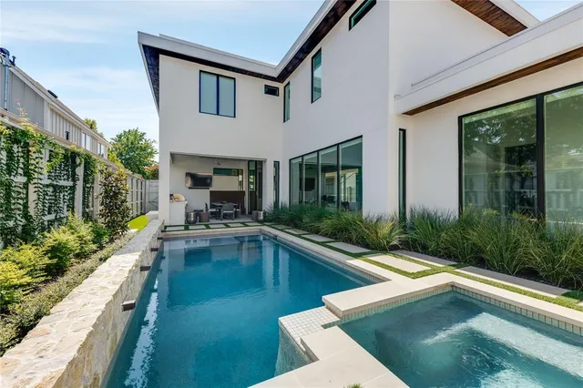a kitchen with stove and cabinets