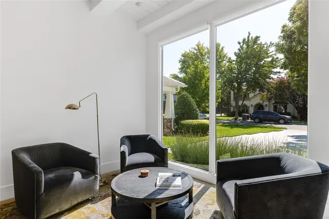 a view of an outdoor sitting area with furniture