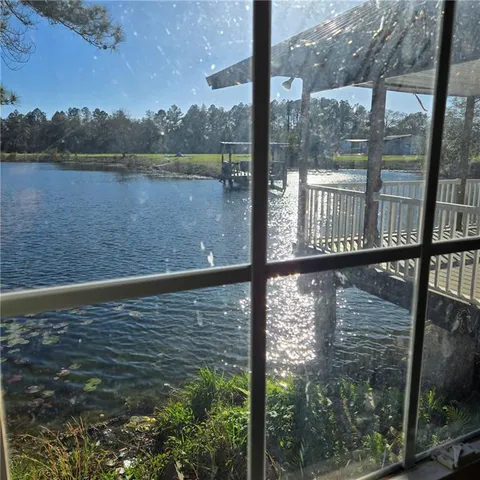 a view of a lake from a balcony