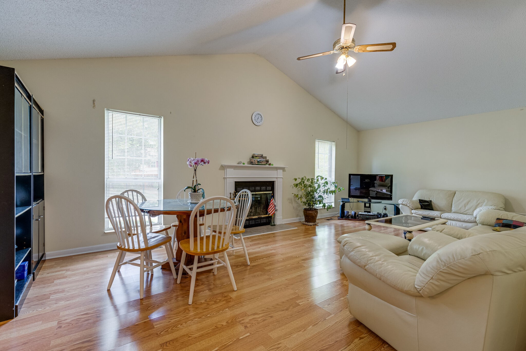3545 Country Way Road Antioch, TN 37013 - Photo 6 of 19 a living room with furniture a fireplace and a flat screen tv