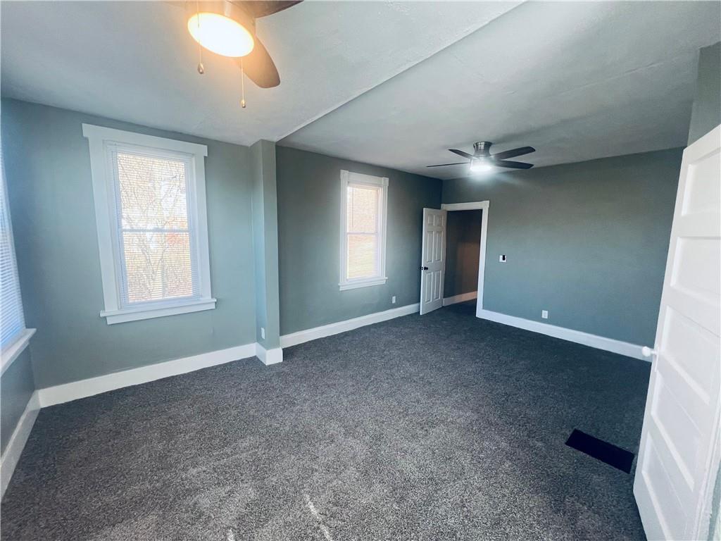 262 Adams Street Pittsburgh, PA 15221 - Photo 13 of 26 an empty room with windows