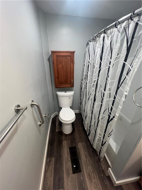 262 Adams Street Pittsburgh, PA 15221 - Photo 17 of 26 a bathroom with a toilet and a shower