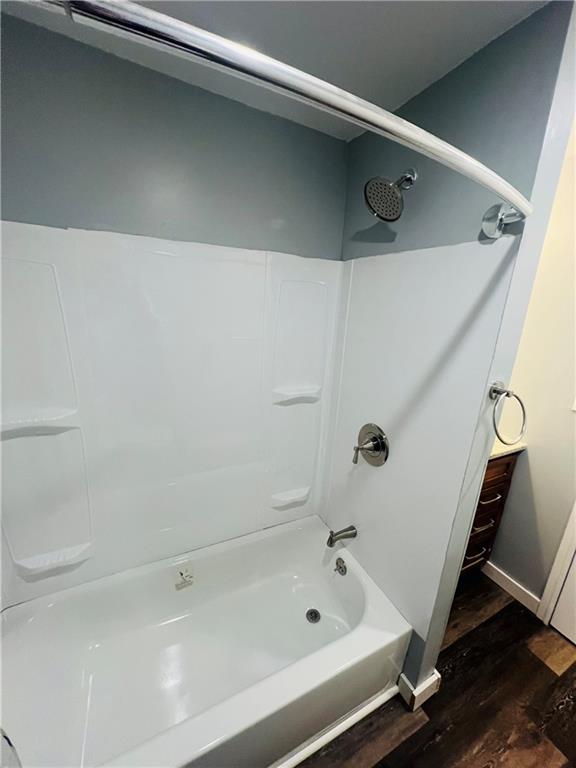 262 Adams Street Pittsburgh, PA 15221 - Photo 19 of 26 a bathroom with a tub and shower