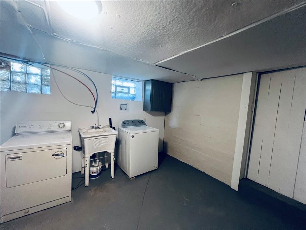 262 Adams Street Pittsburgh, PA 15221 - Photo 23 of 26 a utility room with dryer and washer