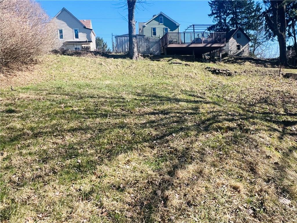 262 Adams Street Pittsburgh, PA 15221 - Photo 24 of 26 a view of a yard with wooden fence