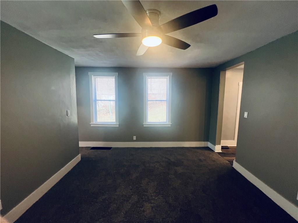 262 Adams Street Pittsburgh, PA 15221 - Photo 4 of 26 an empty room with windows