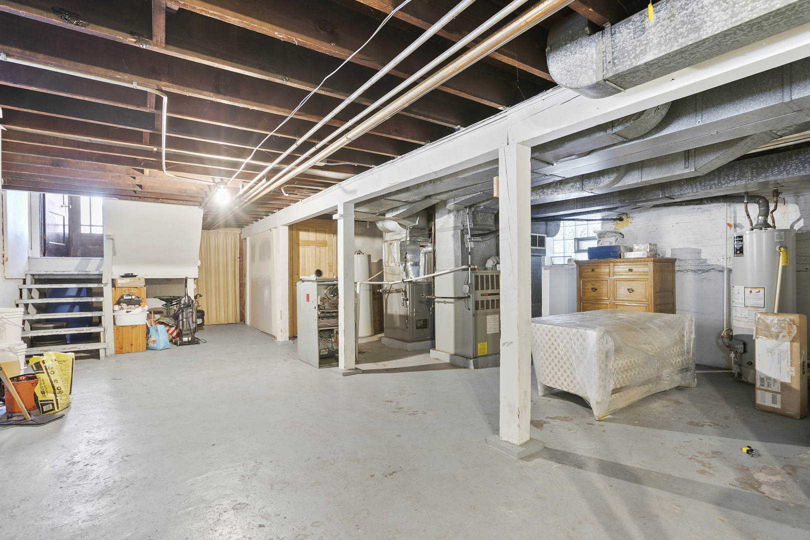 6133 West Rosedale Avenue Chicago, IL 60646 - Photo 6 of 11 a view of a room with wooden ceiling