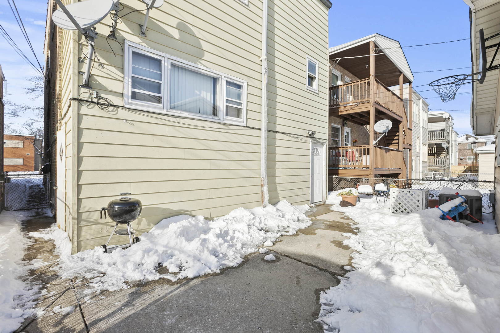 6133 West Rosedale Avenue Chicago, IL 60646 - Photo 7 of 11 a view of a house with a yard