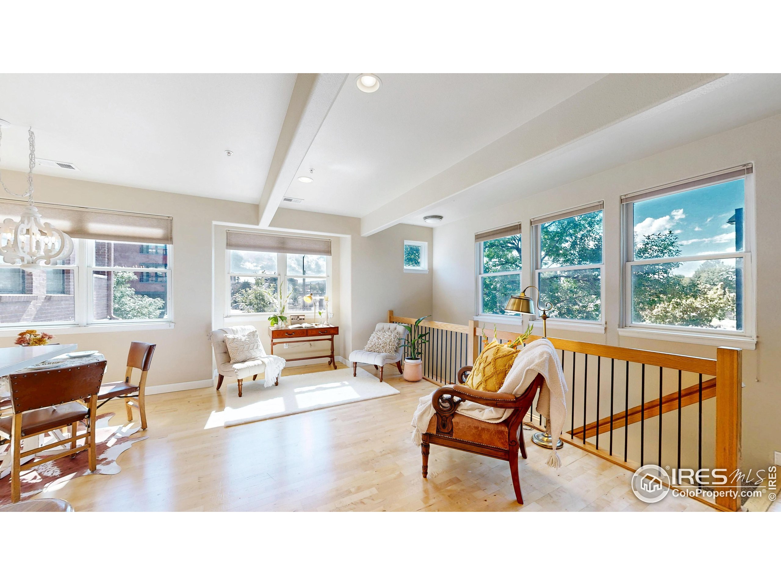 214 Willow Street, Unit 1 Fort Collins, CO 80524 - Photo 6 of 48 a living room with furniture and a large window