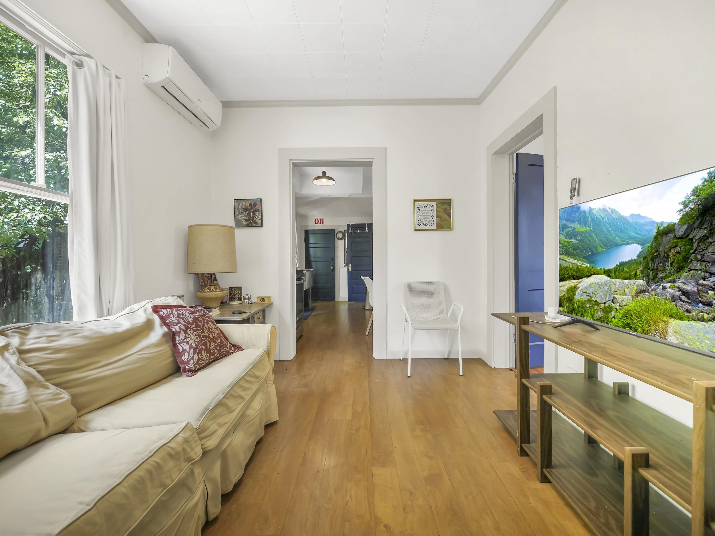 8 Davis Street St. Augustine, FL 32084 - Photo 11 of 36 a living room with furniture and a large window