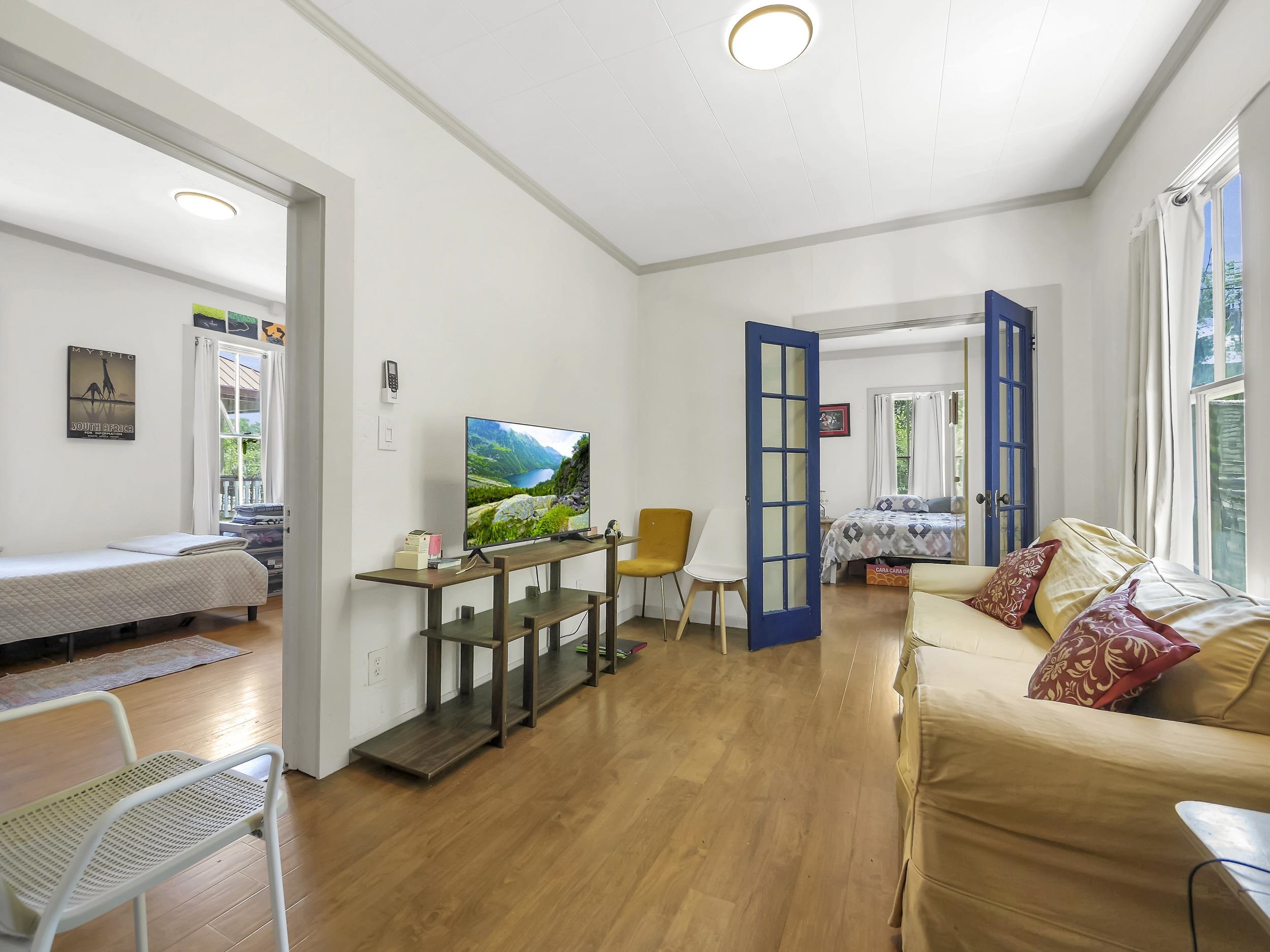 8 Davis Street St. Augustine, FL 32084 - Photo 12 of 36 a living room with furniture and a wooden floor
