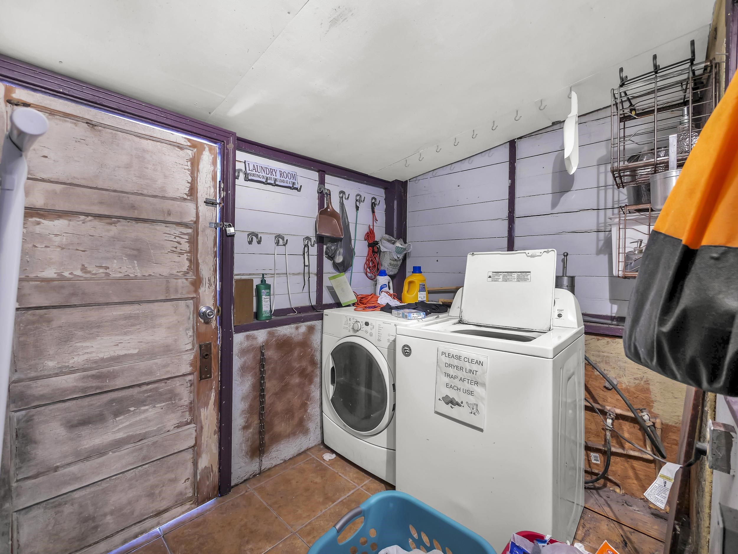 8 Davis Street St. Augustine, FL 32084 - Photo 16 of 36 a utility room with dryer and washer