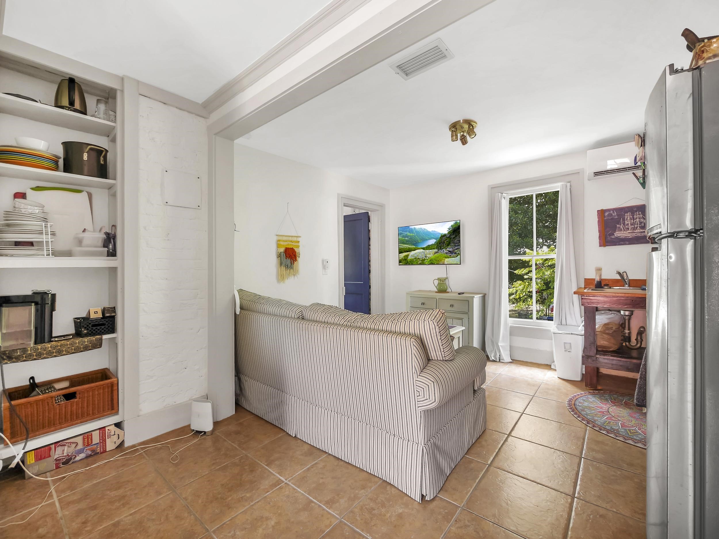 8 Davis Street St. Augustine, FL 32084 - Photo 22 of 36 a bed room with furniture and a window