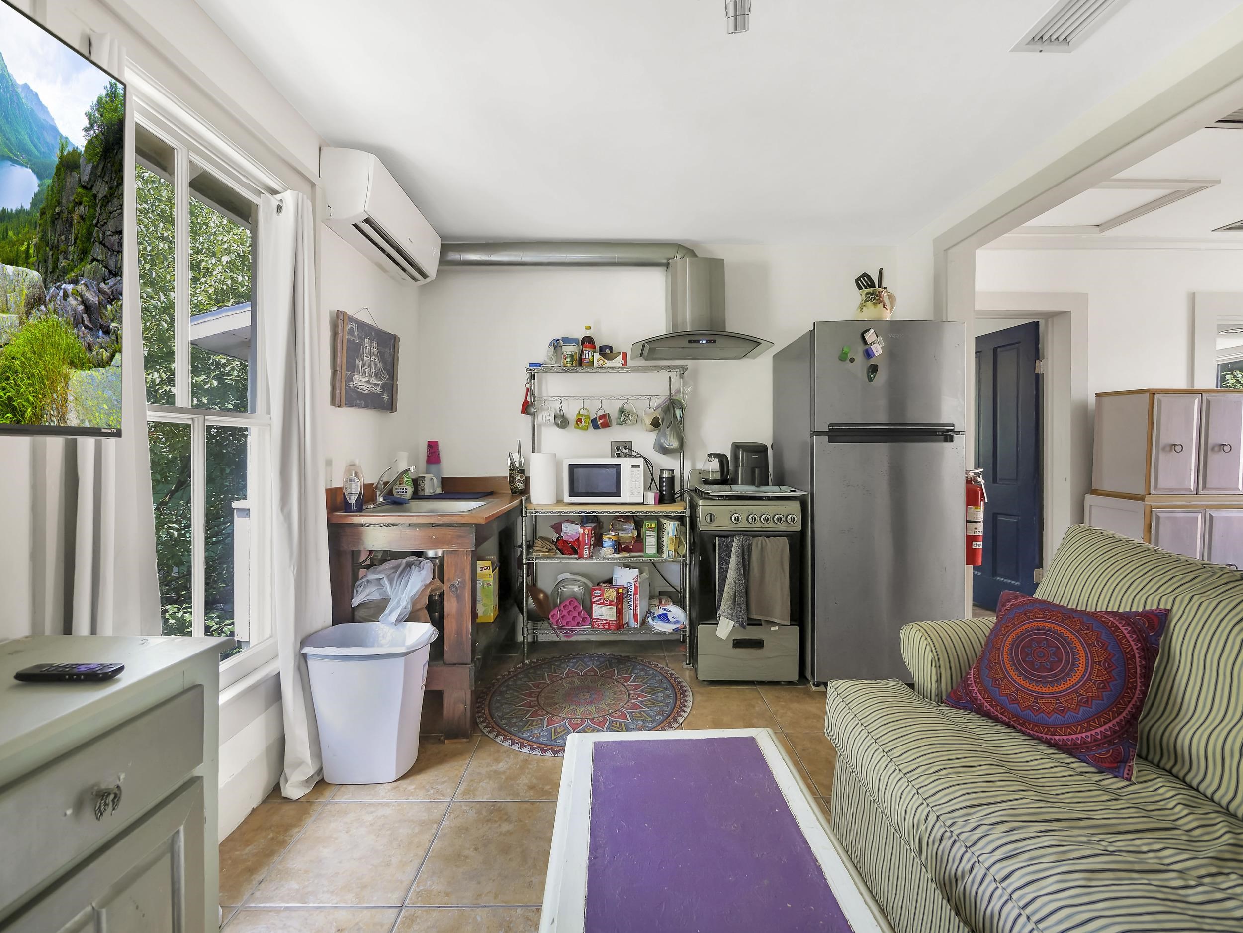 8 Davis Street St. Augustine, FL 32084 - Photo 24 of 36 a living room with furniture and a couch