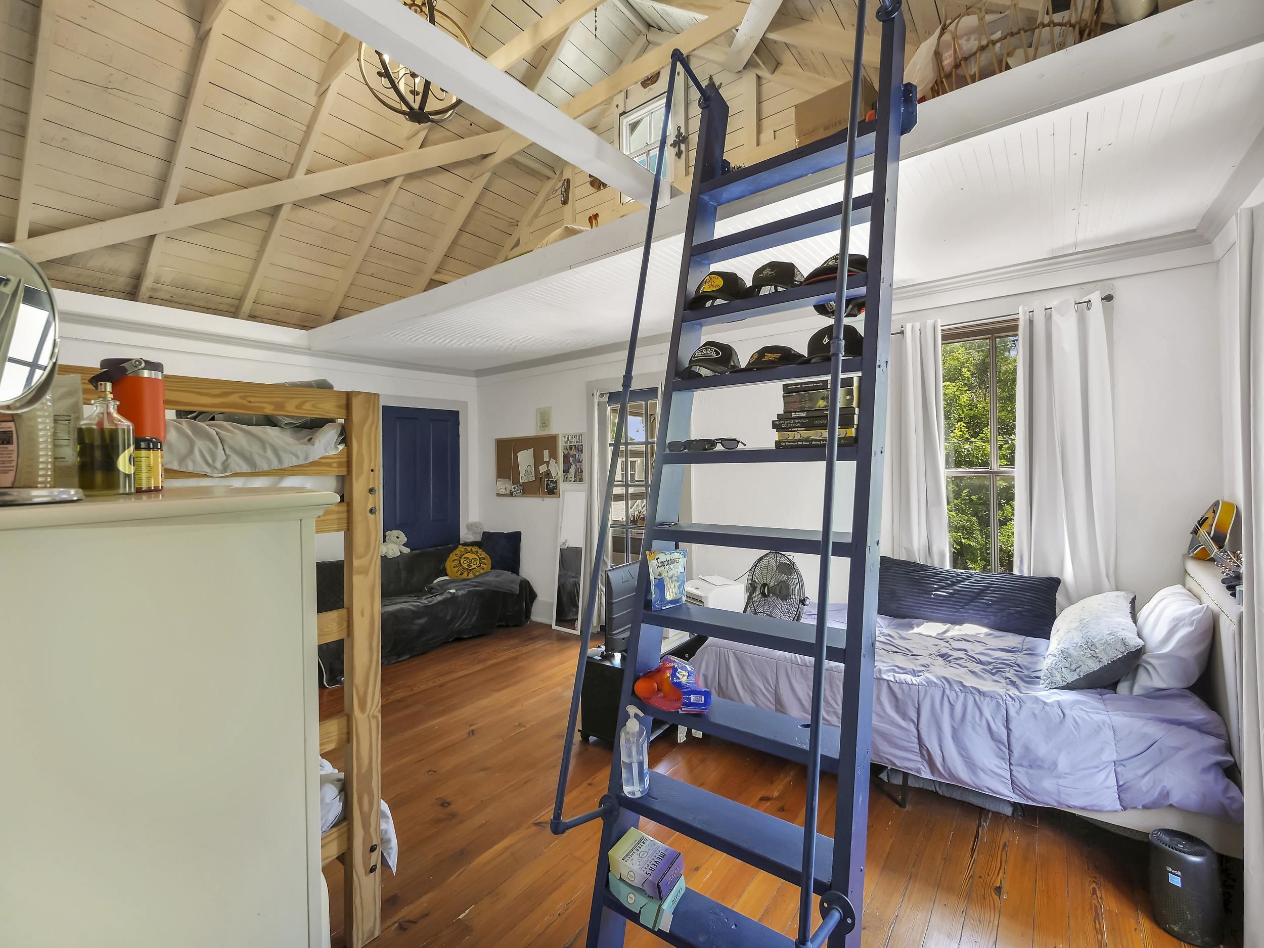 8 Davis Street St. Augustine, FL 32084 - Photo 25 of 36 a living room with furniture and a window