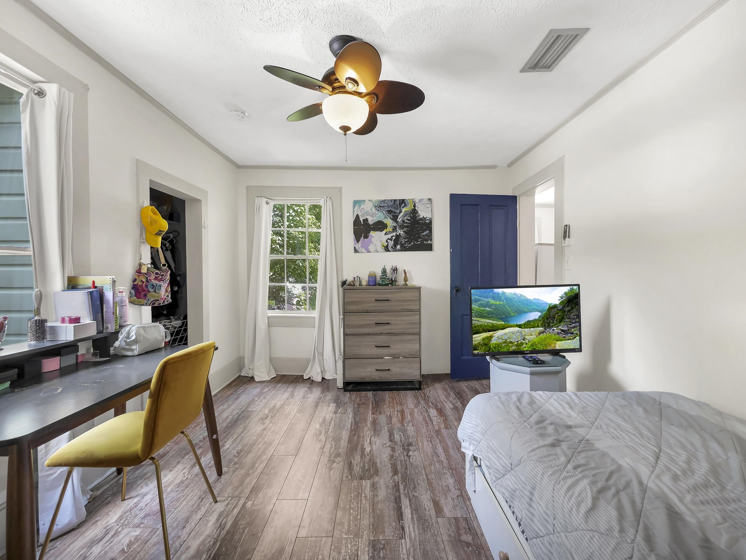 8 Davis Street St. Augustine, FL 32084 - Photo 30 of 36 a bed room with a bed and furniture