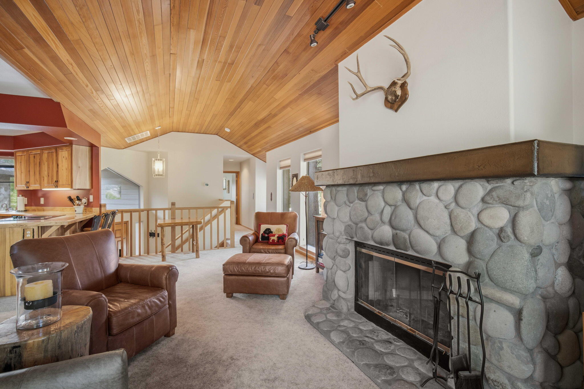 17682 Bittern Lane, Unit 31 Sunriver, OR 97707 - Photo 19 of 44 a living room with furniture and a fireplace