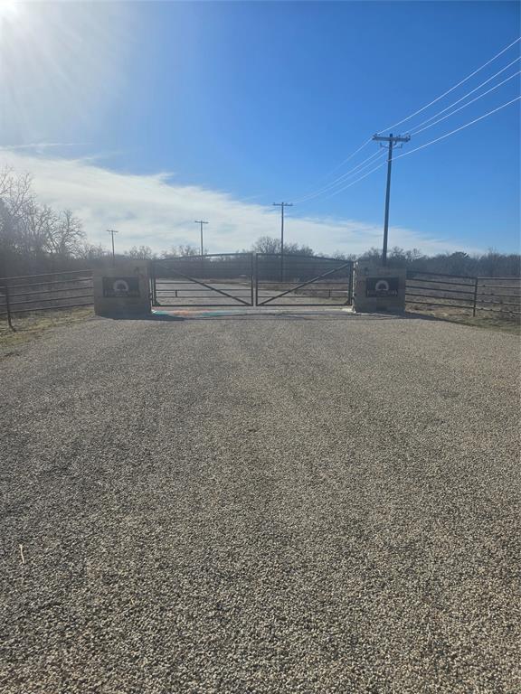 30 Oasis Court Perrin, TX 76486 - Photo 10 of 15 a view of a road with an ocean view