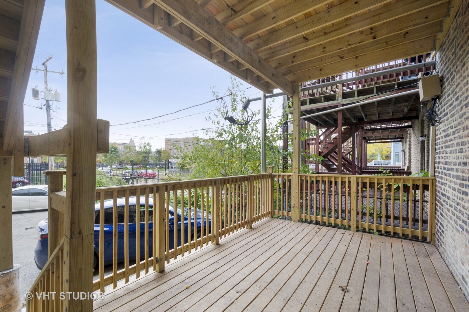 4530 South Prairie Avenue, Unit 1N Chicago, IL 60653 - Photo 11 of 11 a view of a balcony with wooden floor