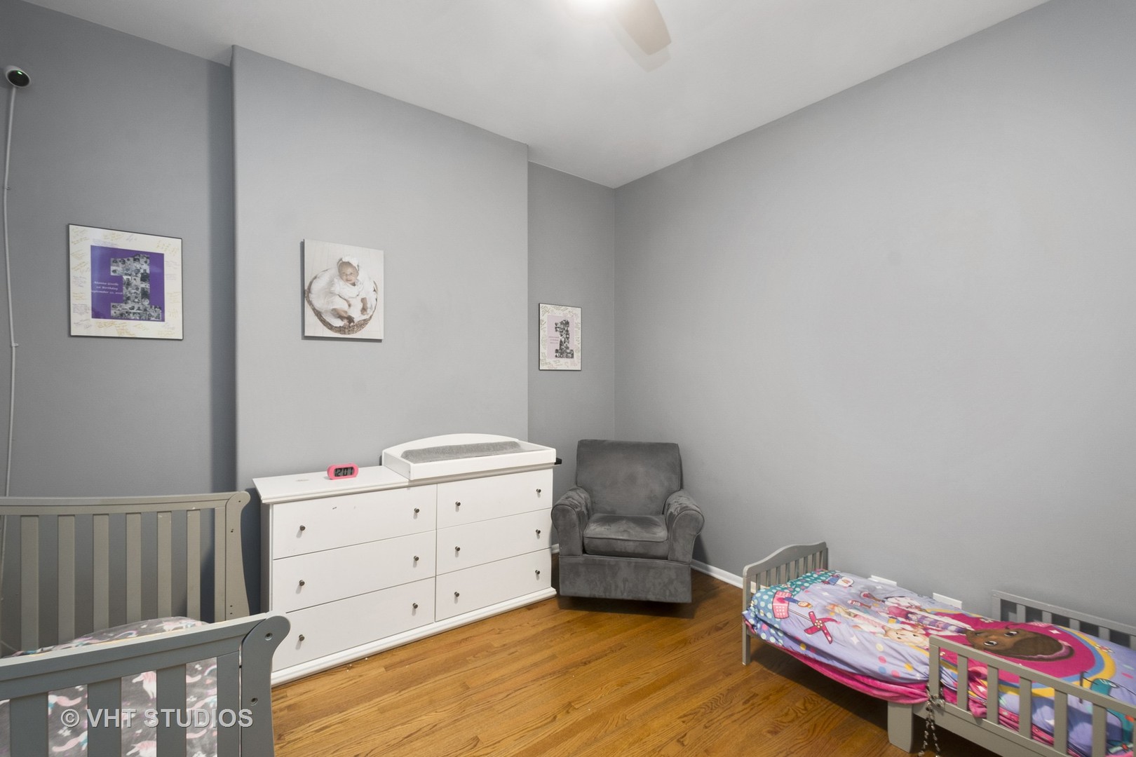 4530 South Prairie Avenue, Unit 1N Chicago, IL 60653 - Photo 7 of 11 a room with toys and dresser