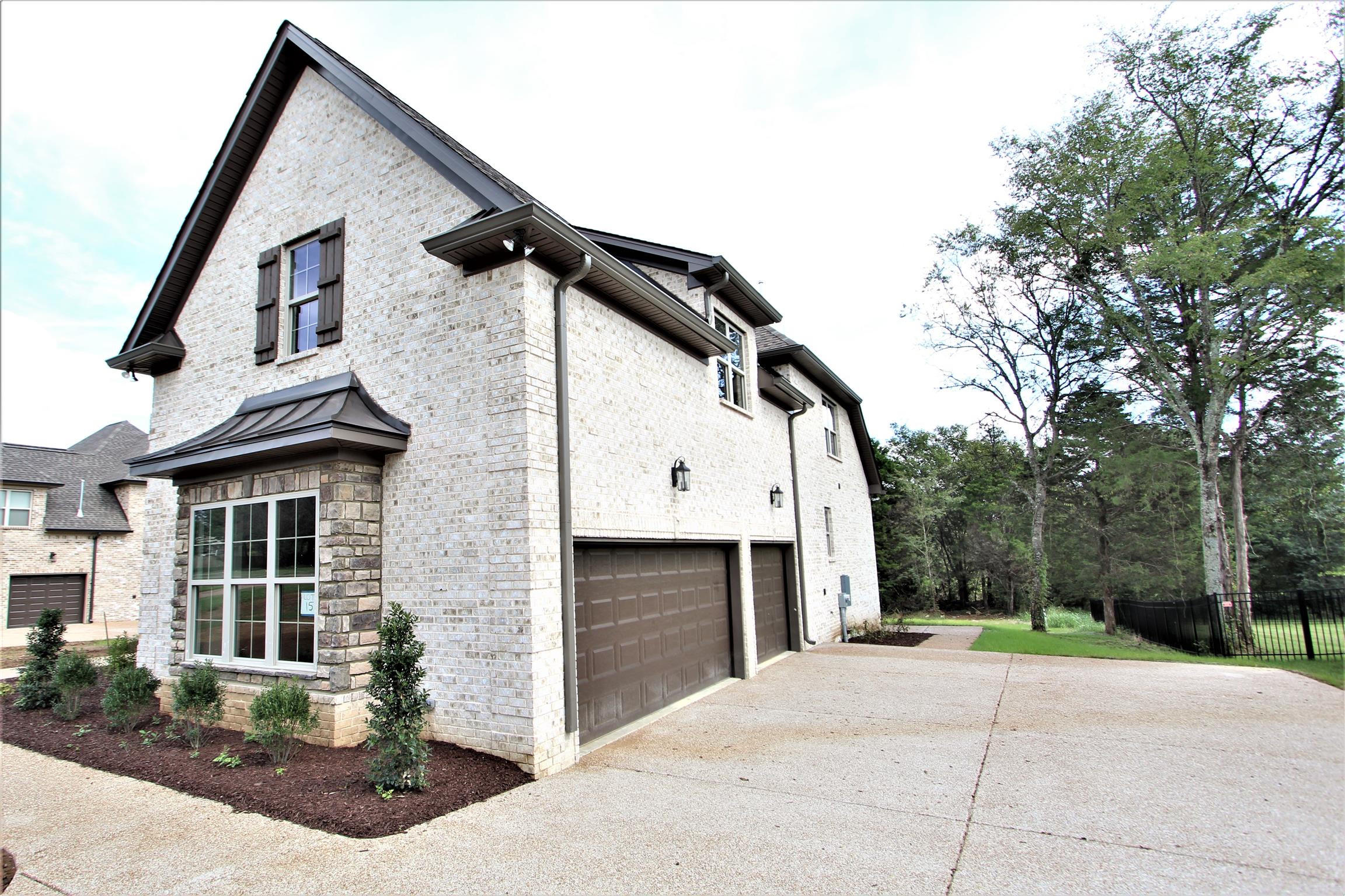 1223 Mires Road, Unit 15C Mount Juliet, TN 37122 - Photo 29 of 29 3-Car Side Entry Garage With Large Turnaround