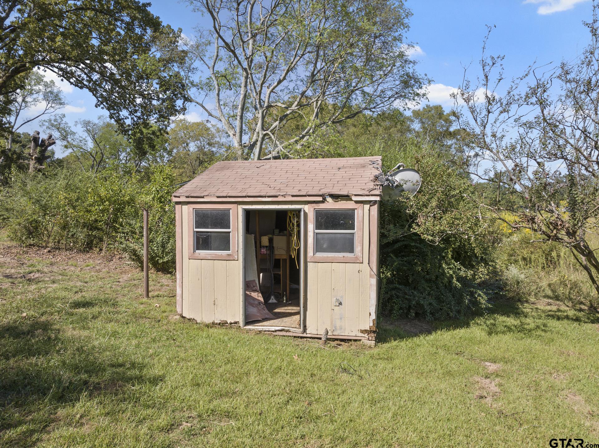 302 Smith Street Naples, TX 75568 - Photo 25 of 28 a view of house with outdoor space