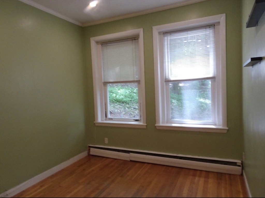 15 University, Unit 22 Brookline, MA 02445 - Photo 7 of 10 an empty room with window