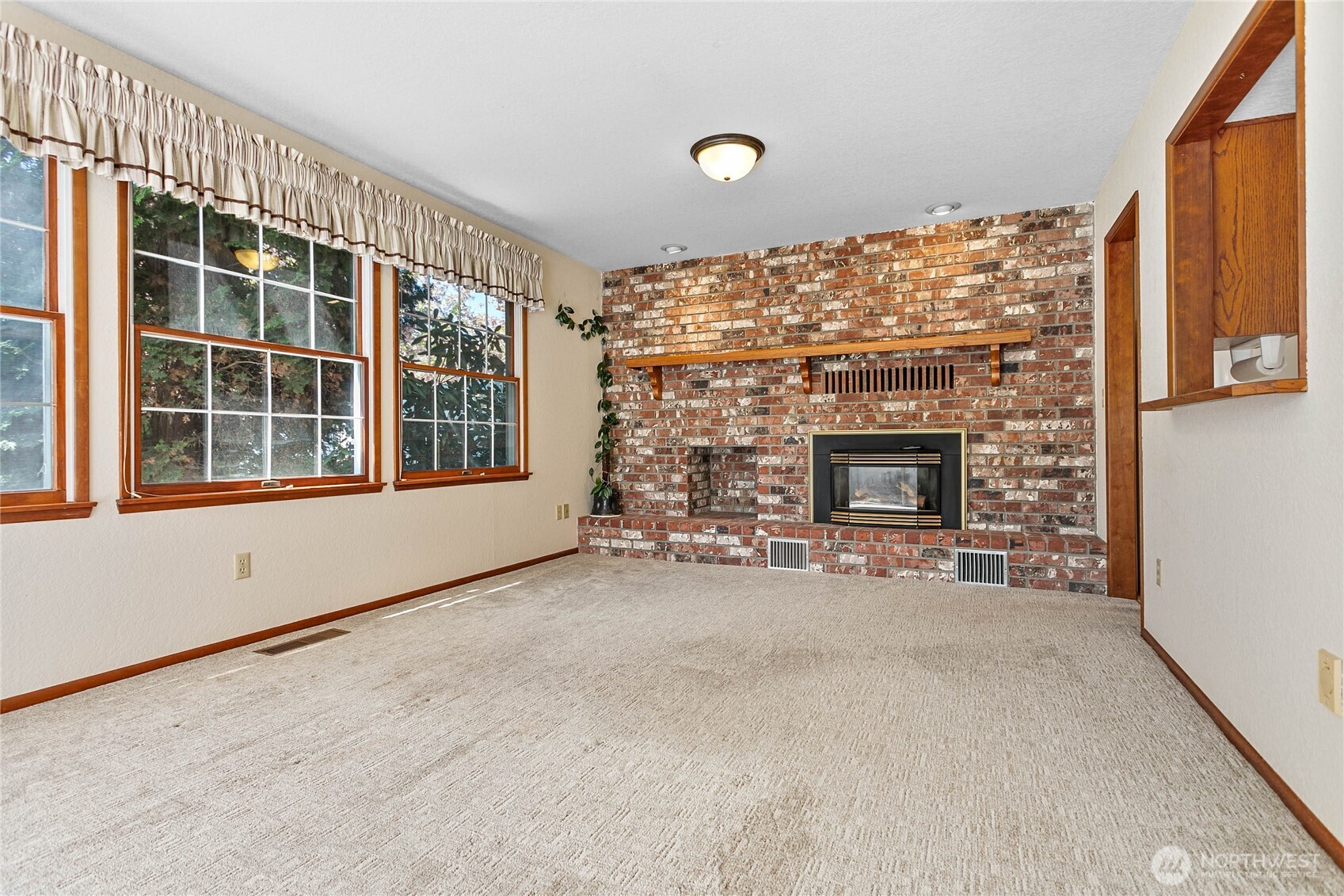 1843 Main Street, Unit A1 Lynden, WA 98264 - Photo 15 of 37 an empty room with windows