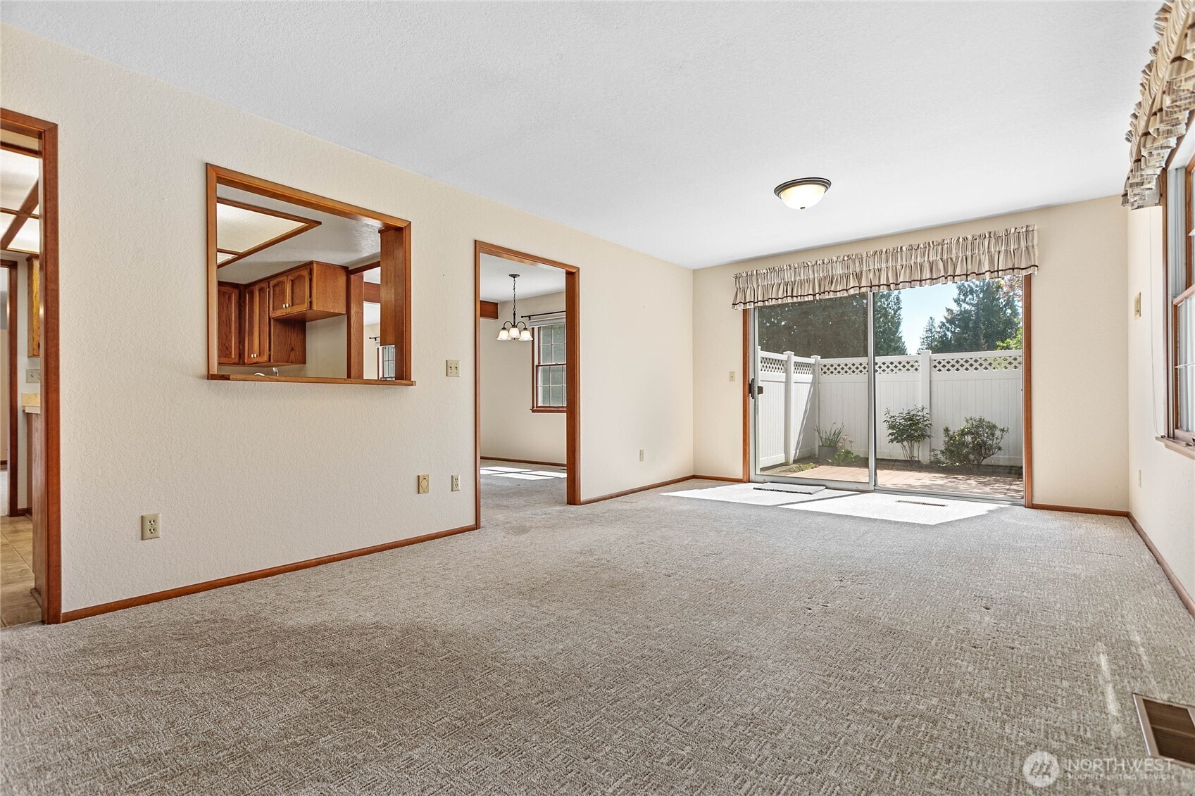 1843 Main Street, Unit A1 Lynden, WA 98264 - Photo 17 of 37 an empty room with a fireplace