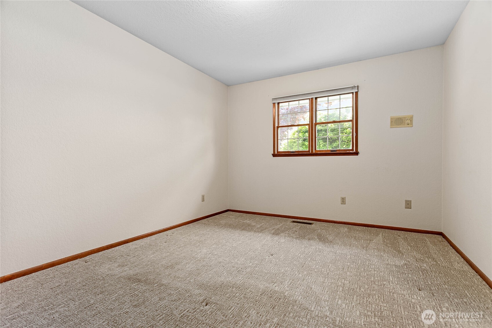 1843 Main Street, Unit A1 Lynden, WA 98264 - Photo 20 of 37 an empty room with a window