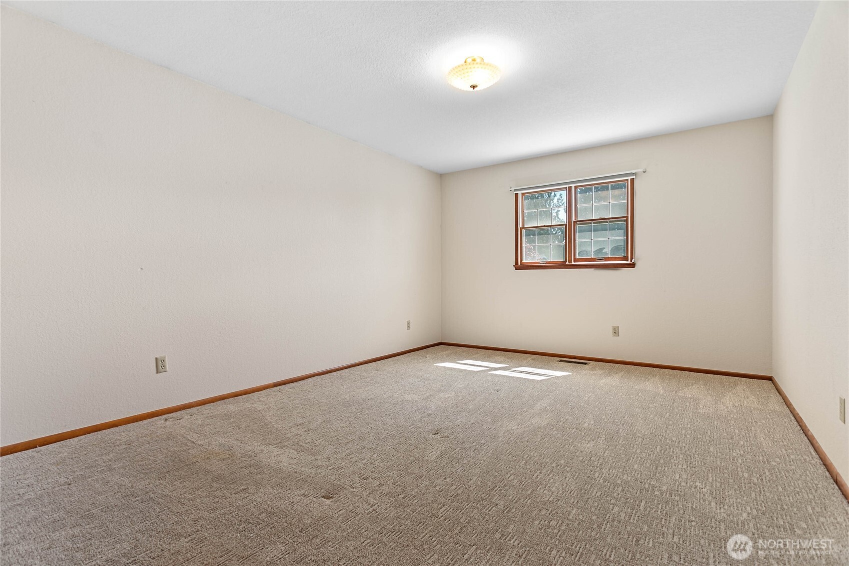 1843 Main Street, Unit A1 Lynden, WA 98264 - Photo 29 of 37 an empty room with windows