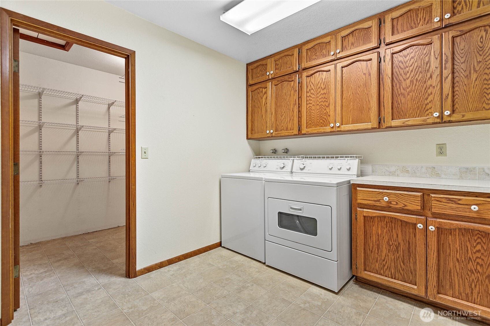 1843 Main Street, Unit A1 Lynden, WA 98264 - Photo 32 of 37 a utility room with dryer and washer