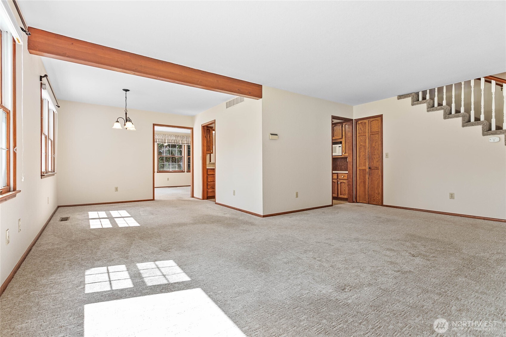 1843 Main Street, Unit A1 Lynden, WA 98264 - Photo 6 of 37 a view of a hallway with a window and stairs