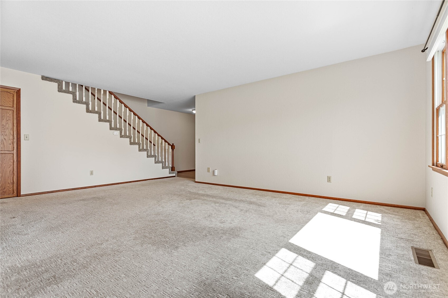 1843 Main Street, Unit A1 Lynden, WA 98264 - Photo 9 of 37 a view of an empty room with stairs