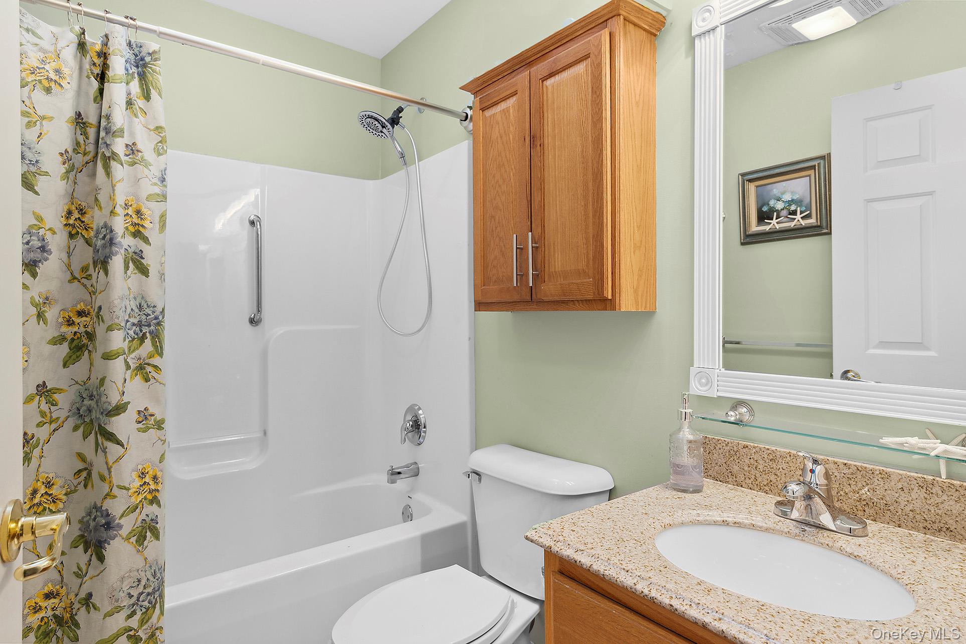 17 Cove View Road Sag Harbor, NY 11963 - Photo 12 of 15 Full bath with vanity and shower / bath combination with curtain
