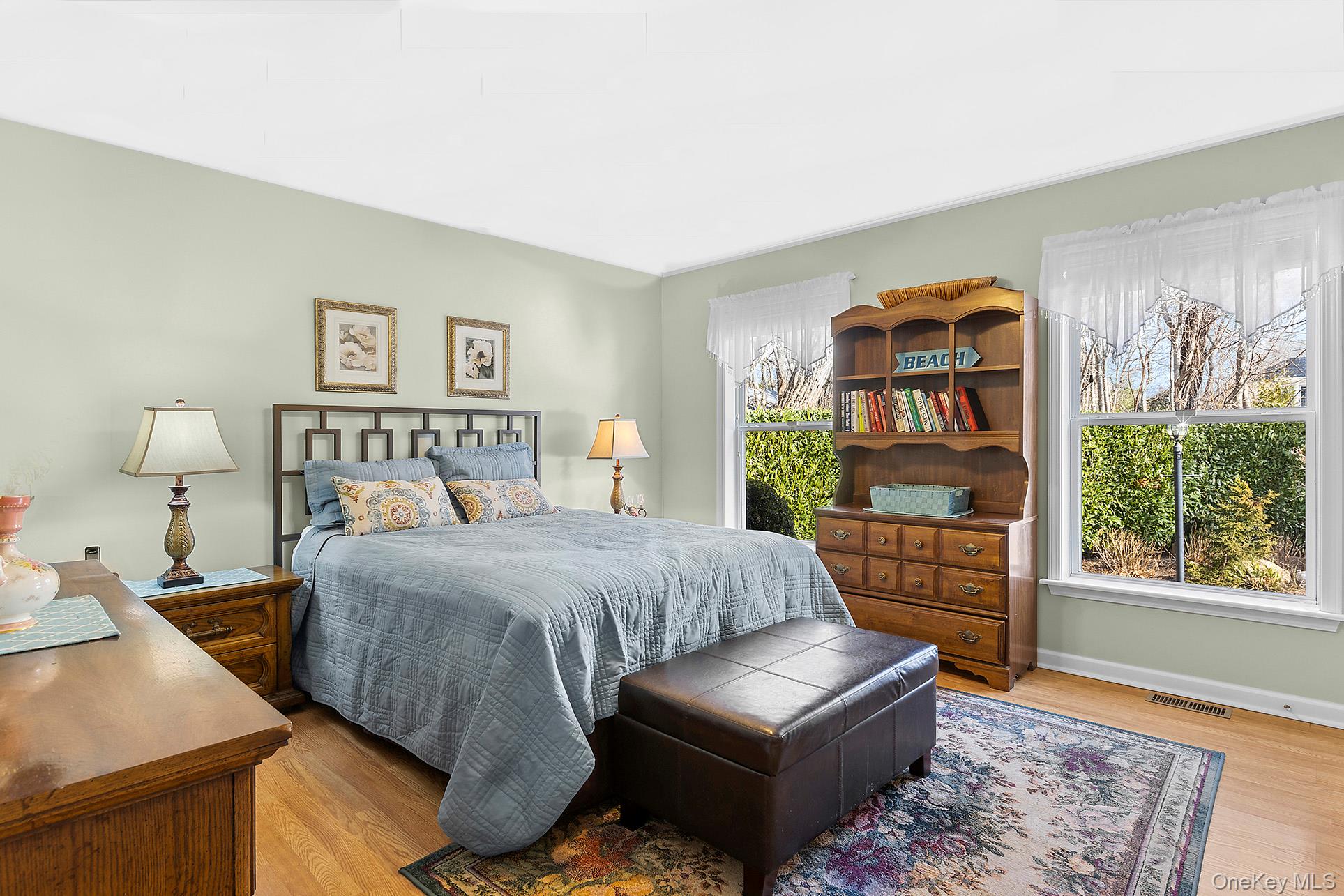 17 Cove View Road Sag Harbor, NY 11963 - Photo 7 of 15 Bedroom featuring wood finished floors and baseboards