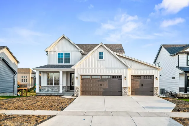 a front view of a house with yard