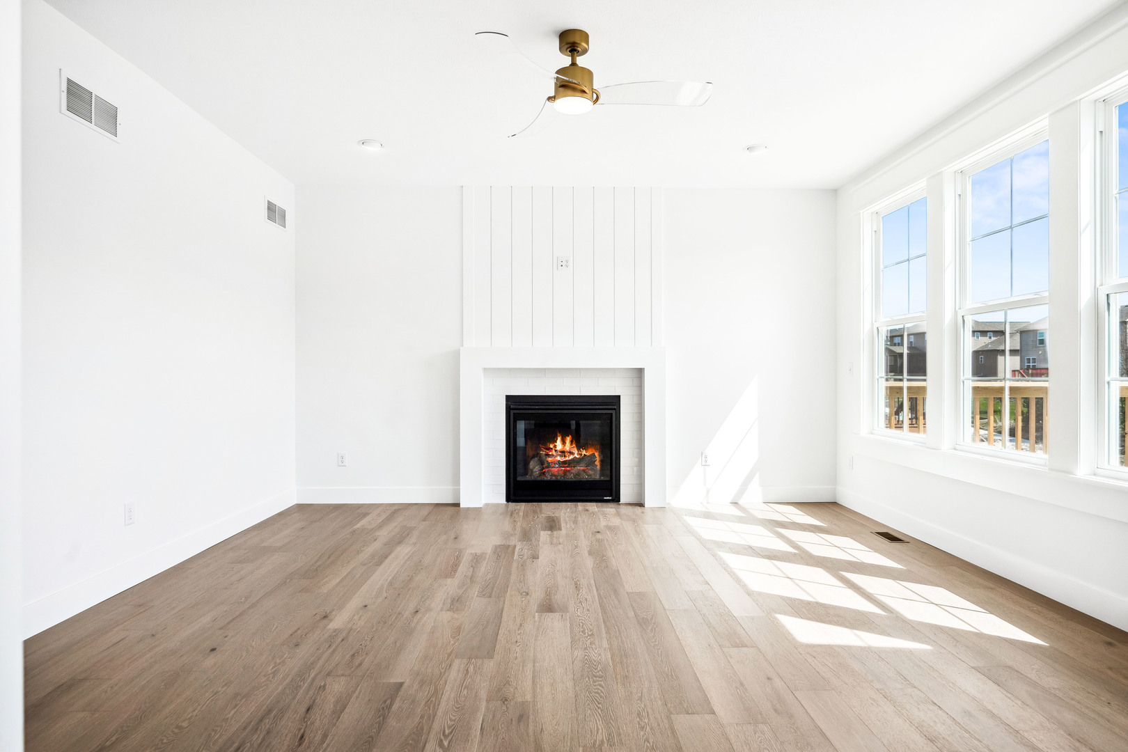 5017 Finlen Lane Bloomington, IL 61705 - Photo 12 of 60 a view of a livingroom with a fireplace and window