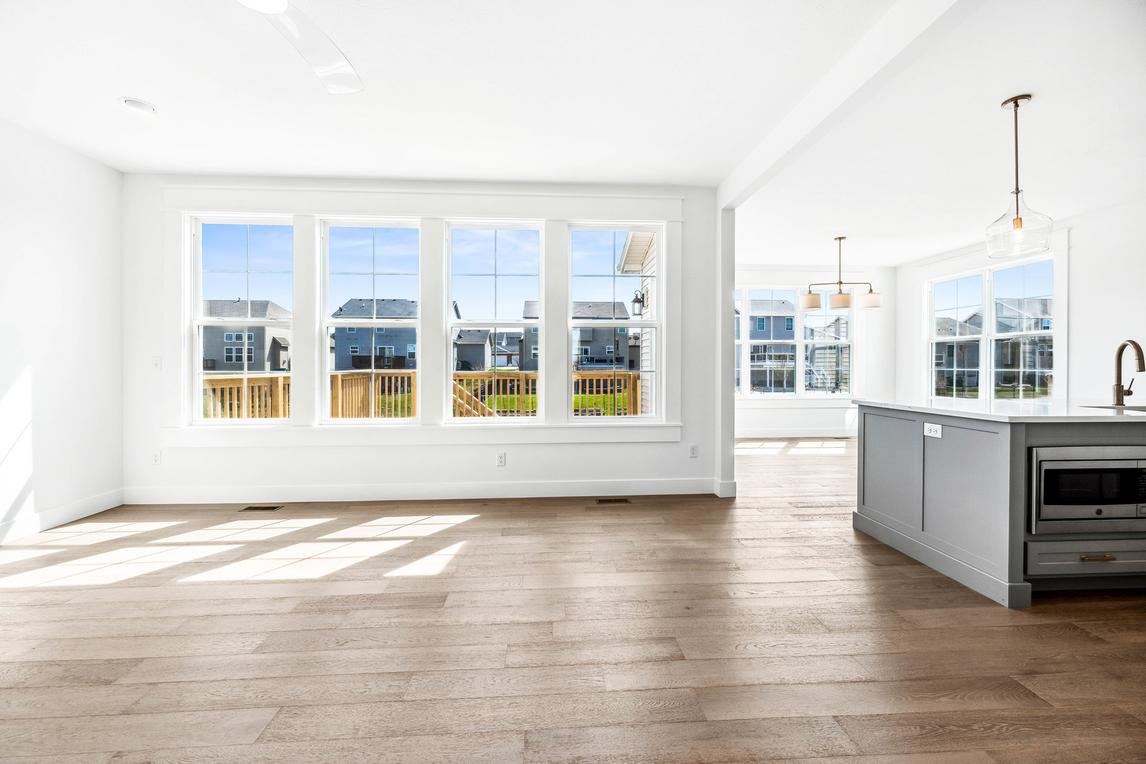 5017 Finlen Lane Bloomington, IL 61705 - Photo 16 of 60 a view of an empty room with kitchen and window