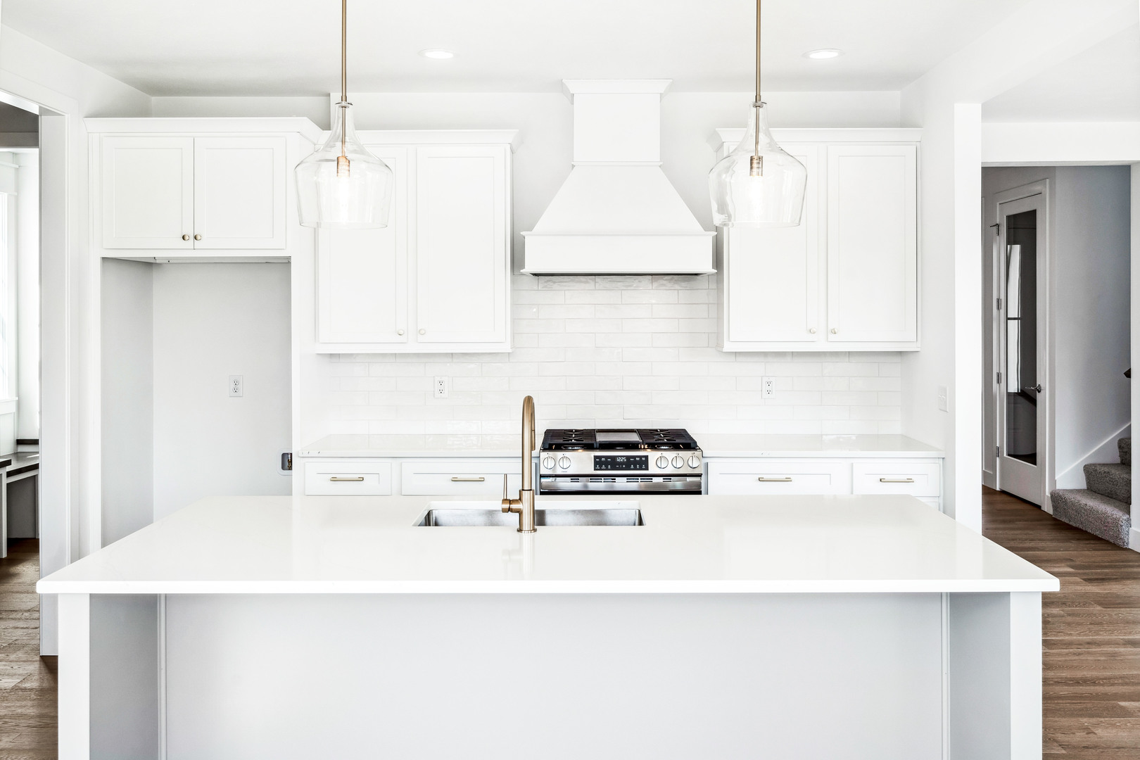 5017 Finlen Lane Bloomington, IL 61705 - Photo 19 of 60 a kitchen with stainless steel appliances a stove a sink a refrigerator and cabinets