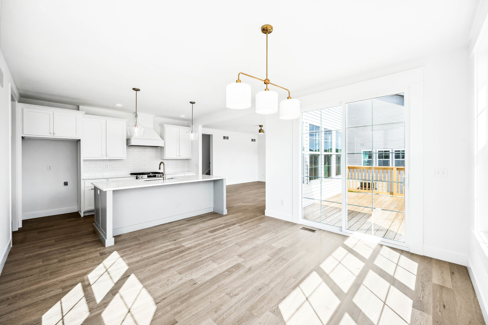 5017 Finlen Lane Bloomington, IL 61705 - Photo 22 of 60 a kitchen with stainless steel appliances kitchen island granite countertop a sink a counter space and cabinets