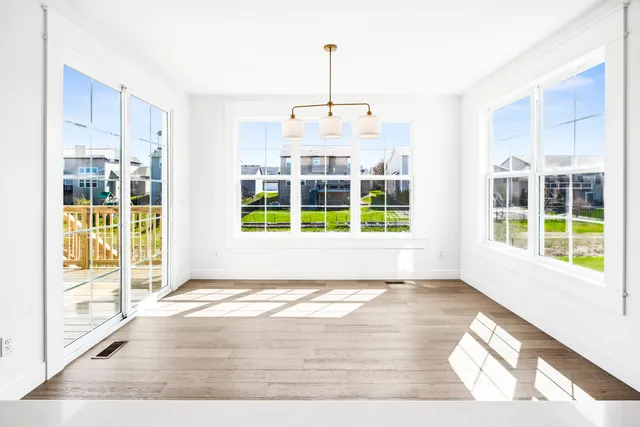 a room with a table and a window