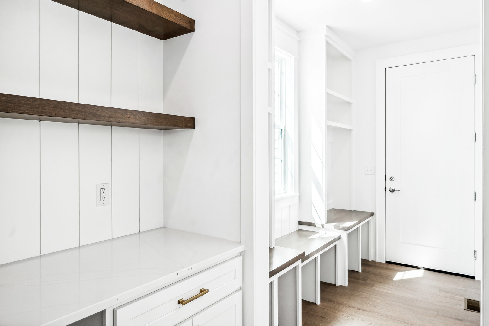 5017 Finlen Lane Bloomington, IL 61705 - Photo 27 of 60 a view of an empty room with wooden floor and a window