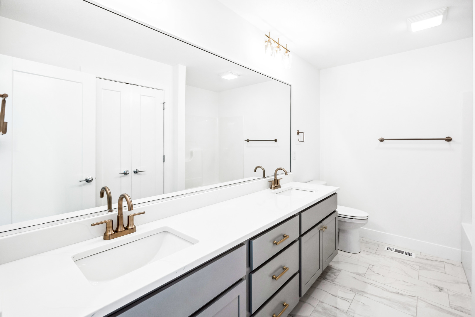 5017 Finlen Lane Bloomington, IL 61705 - Photo 39 of 60 a bathroom with a sink and a mirror