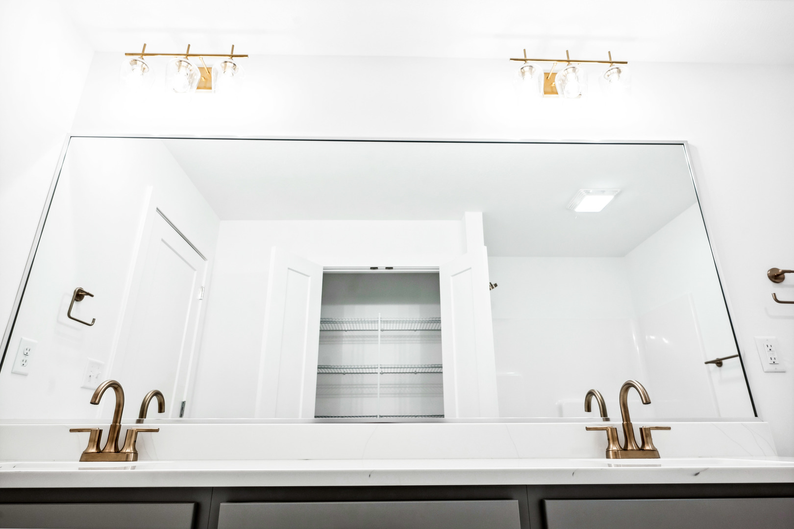 5017 Finlen Lane Bloomington, IL 61705 - Photo 40 of 60 a bathroom with a sink and a mirror