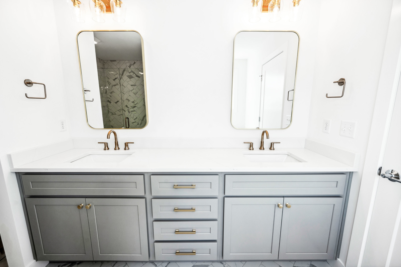 5017 Finlen Lane Bloomington, IL 61705 - Photo 47 of 60 a bathroom with a sink vanity and a mirror