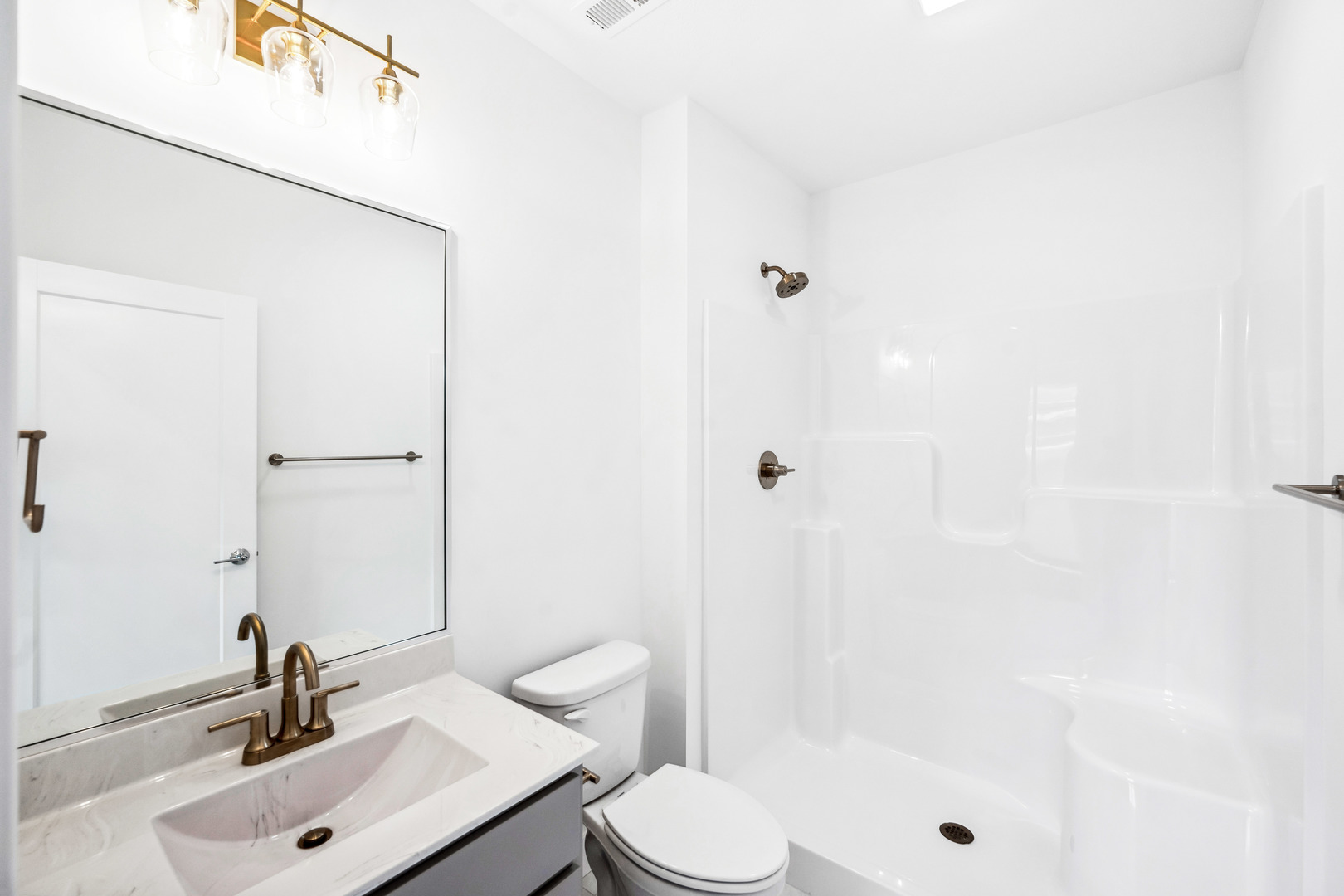 5017 Finlen Lane Bloomington, IL 61705 - Photo 52 of 60 a bathroom with a sink toilet and shower