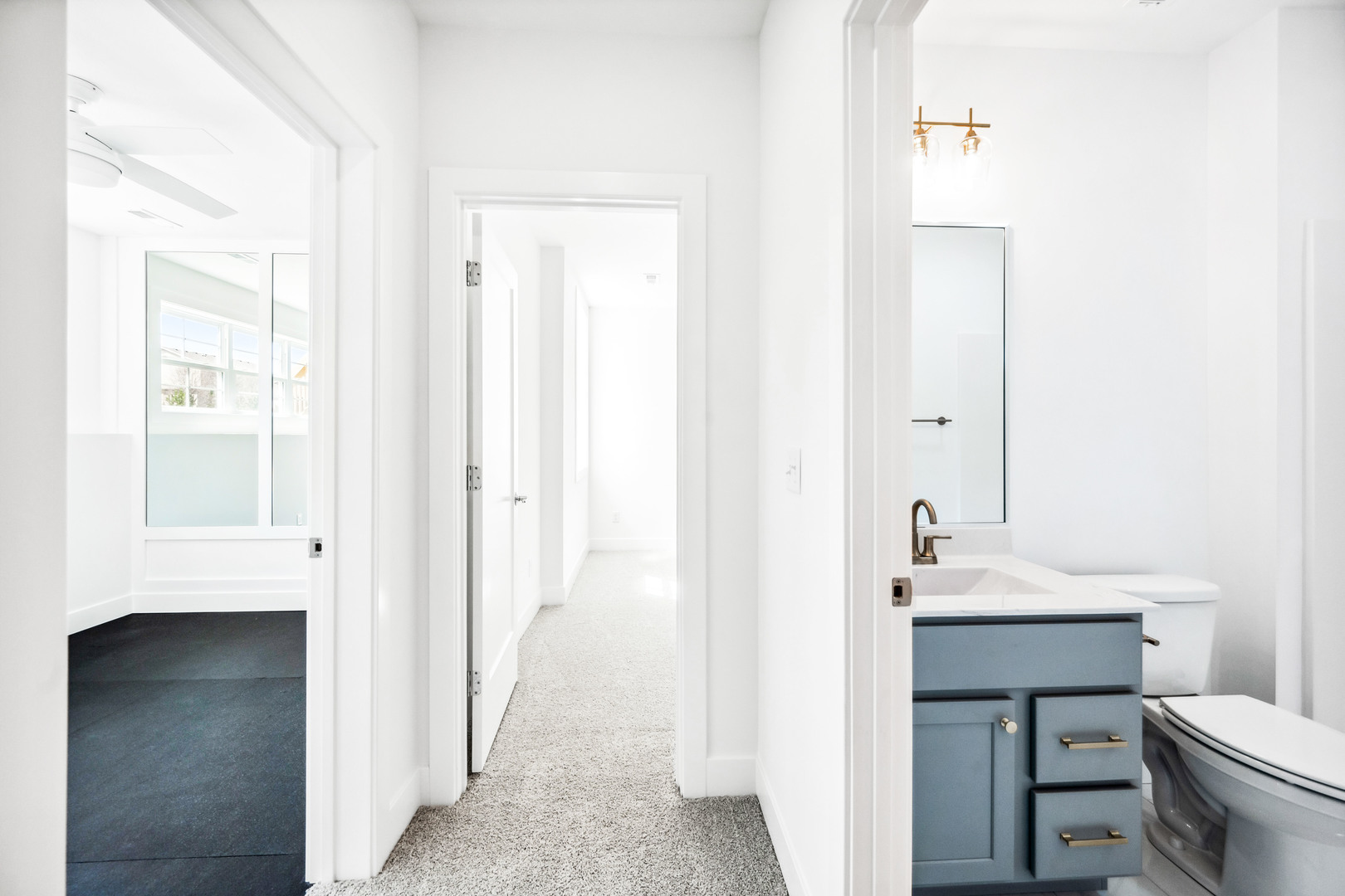 5017 Finlen Lane Bloomington, IL 61705 - Photo 53 of 60 a bathroom with a sink a toilet and a mirror