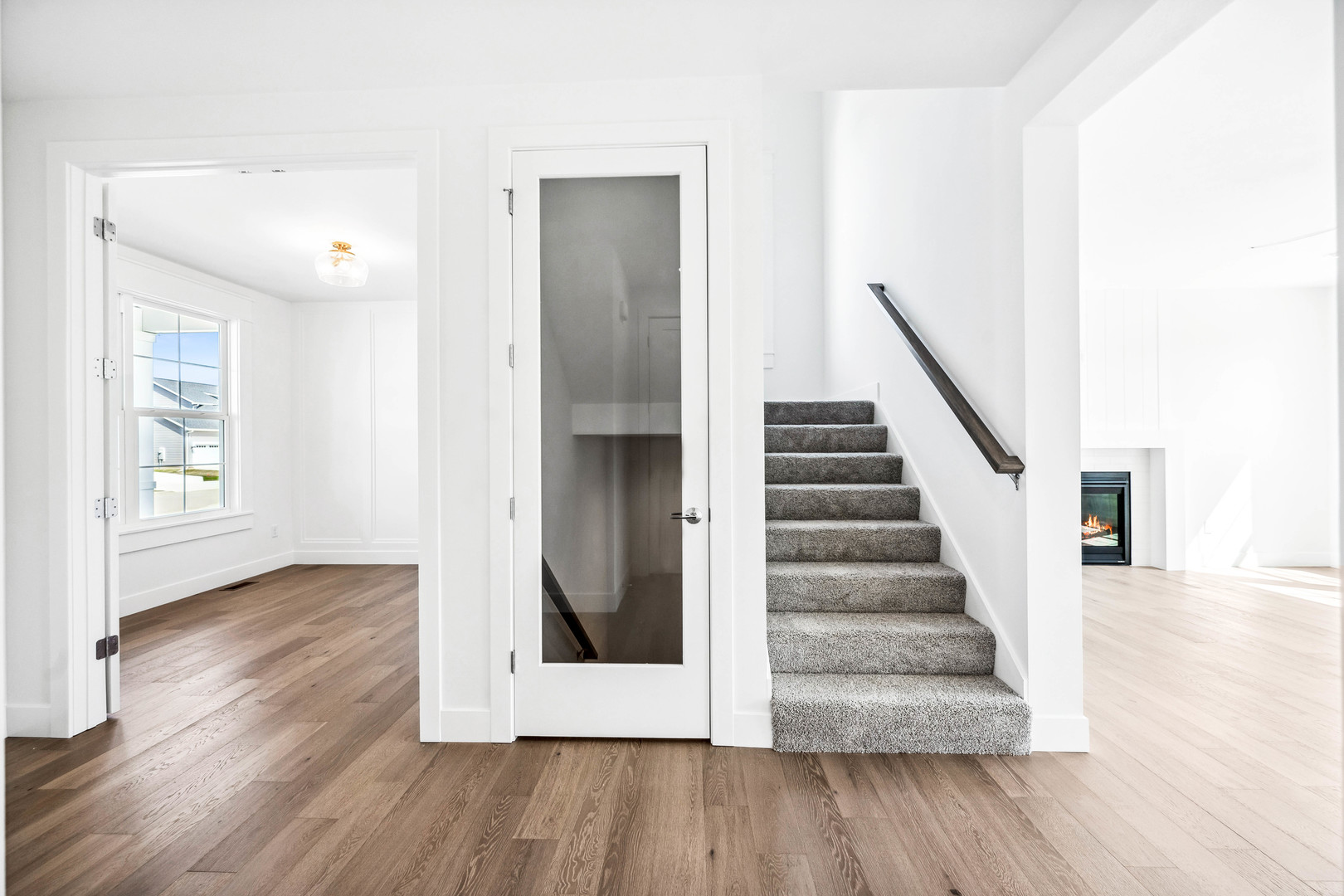 5017 Finlen Lane Bloomington, IL 61705 - Photo 8 of 60 a view of entryway with wooden floor and stairs